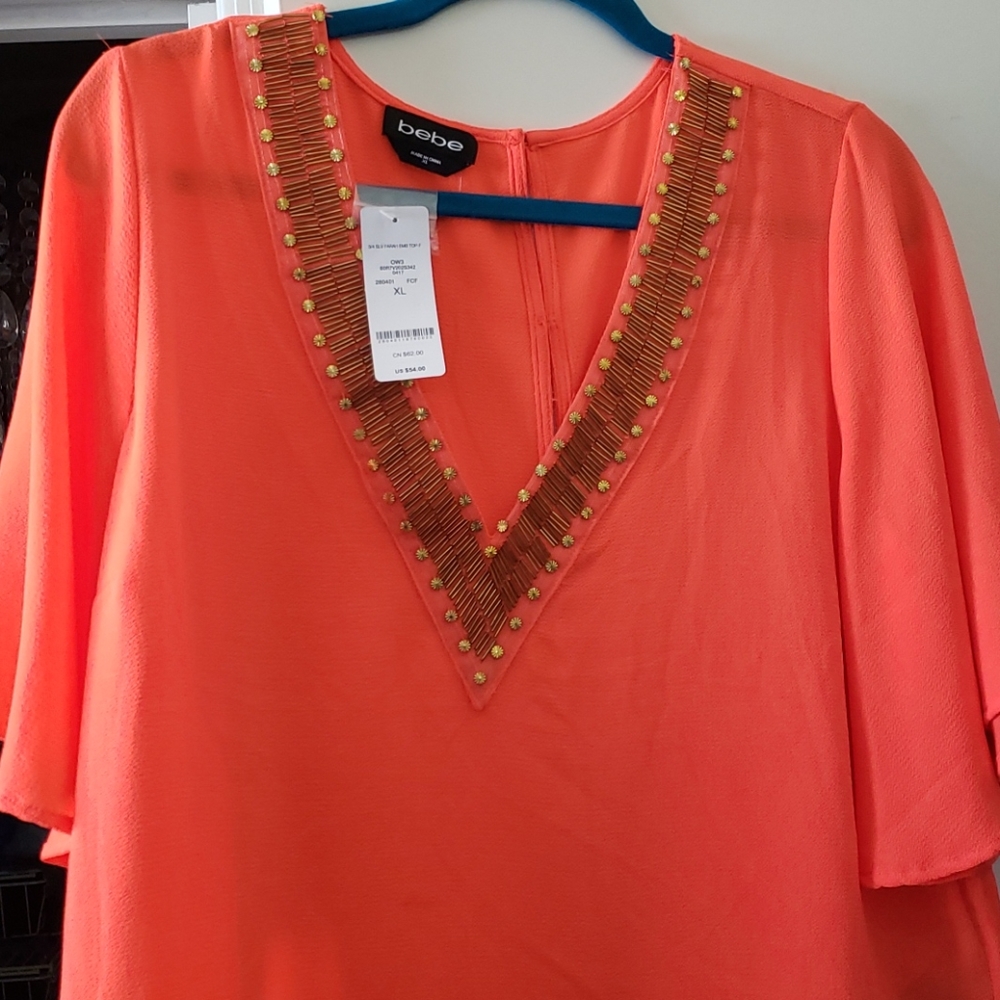 Bebe top orange nwt gold trim
